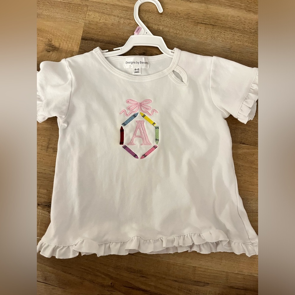 Girls crayon top. Initial A. Size 4-5